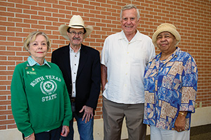 From left, Phala Williams Finley ('65), Jim Hightower ('65), Tony Altermann ('65, '68 M.S.) and Cora Wright ('65) attend this fall's Golden Eagles reunion. (Photo by Gary Payne)