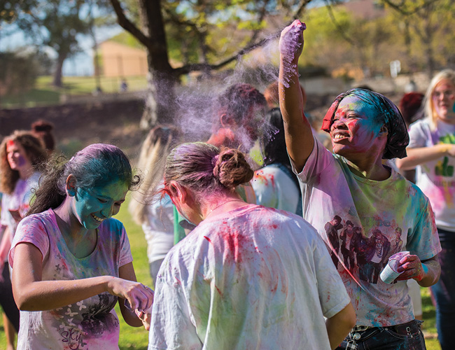 UNT students participated in a Holi Day celebration March 23 on the Library Mall. Hosted by the University Program Council, the event celebrates the Hindu tradition also known as the Festival of Colors, associated with the arrival of spring. (Photo by Ahna Hubnik)