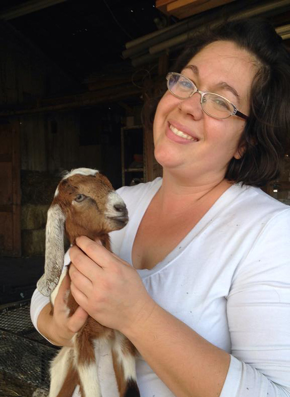 Jonna Hopewell Payne Davis holding a baby goat
