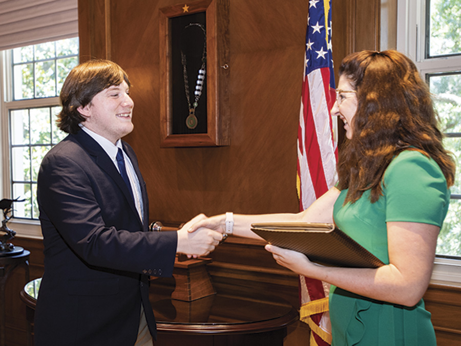 Andy McDowall is sworn in as a non-voting Student Regent. 