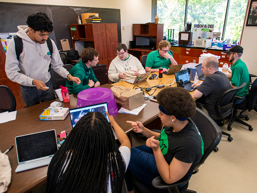 The UNT student debate team practices for a tournament. 