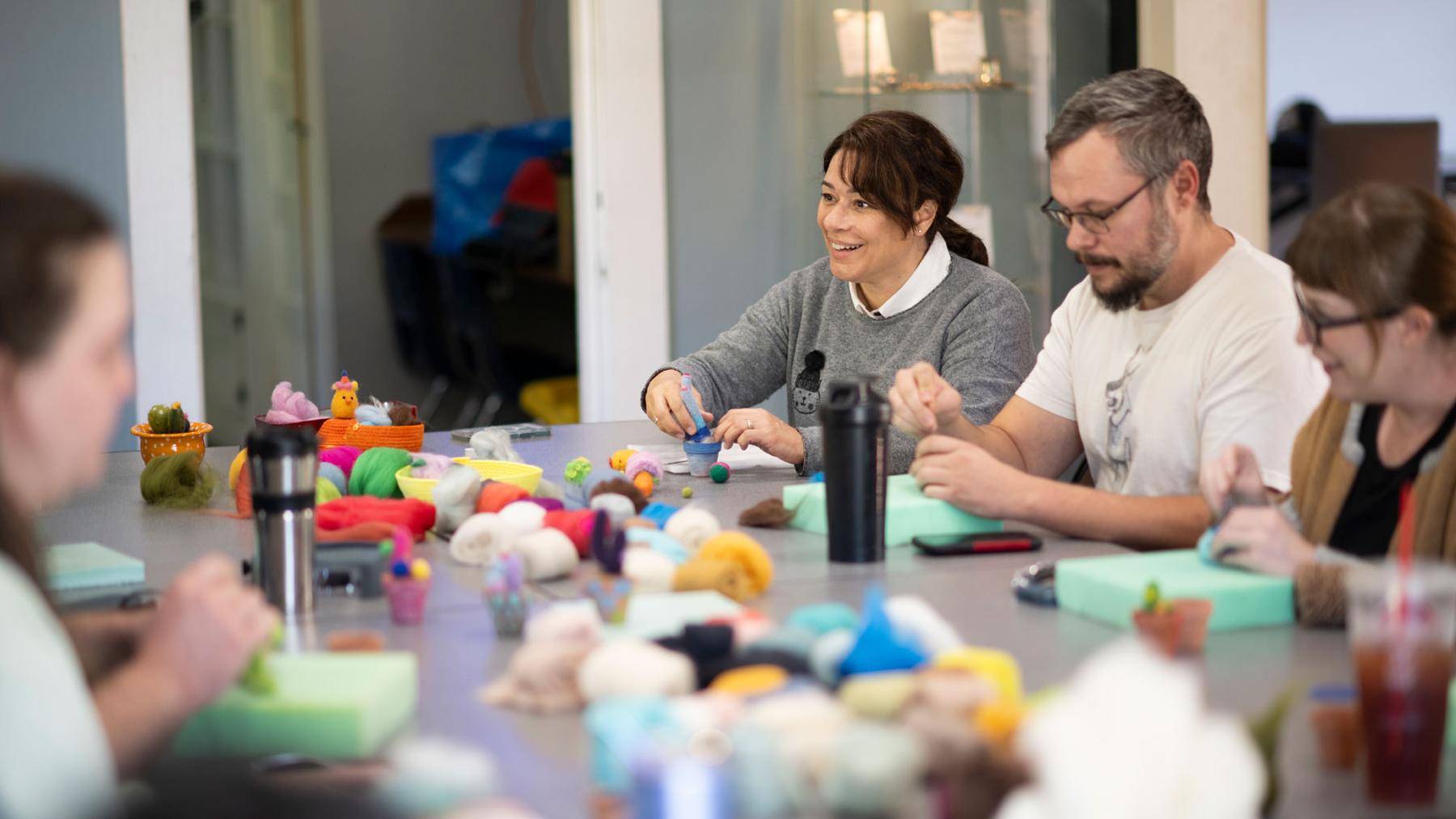 Umut Demirgüç Thurman leads the needle felted cactus workshop at the Denton Maker Center.