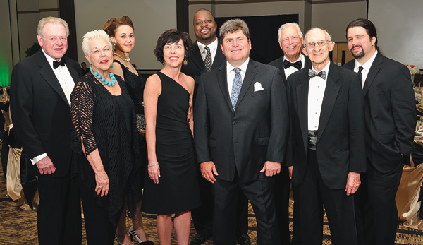 Honored at the Alumni Awards Dinner were, from left, R.L. Crawford Jr. (’63), Brenda Crawford (’63), Petronel Malan (’96 M.M., ’01 Ph.D.), Julie Anderson (’91, ’91 M.S.), Brian Waters, David Anderson (’99), Donald C. Potts (’63), Robert J. “Bob” Rogers and Jason West (’96). (Photo by Jonathan Reynolds) 