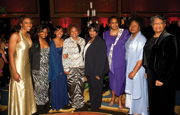 Four alums who were Epsilon Mu sorority sisters at UNT visited with students and friends at the ball. From left are senior Latyna Caldwell, senior Emerald Eagle Scholar Vanessa Lewis, Dimakatso Hayes, Jacqueline Brown ('70), Evelyn Mitchell, Johnie Pearl Mitchell Qualls ('71), Shirley Levels ('71) and Alberta Rencher ('71). (Photo by Angilee Wilkerson)