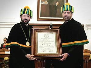 UNT Provost Warren Burggren, right, receiving his Honorary President award from UAEM Rector C. Eduardo Gasca Pliego, left, this fall. 