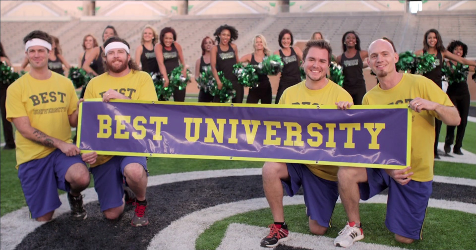 Eli Young Band on a football field with a banner saying best university