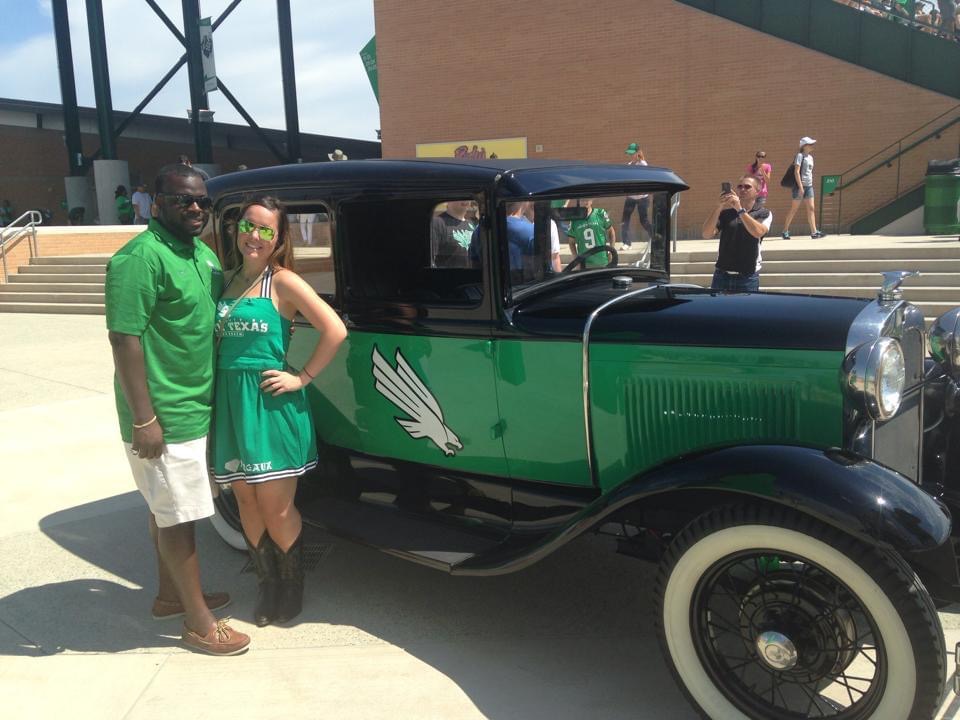 Margaux Ogunsola and TJ Orunsola with the Mean Green Machine