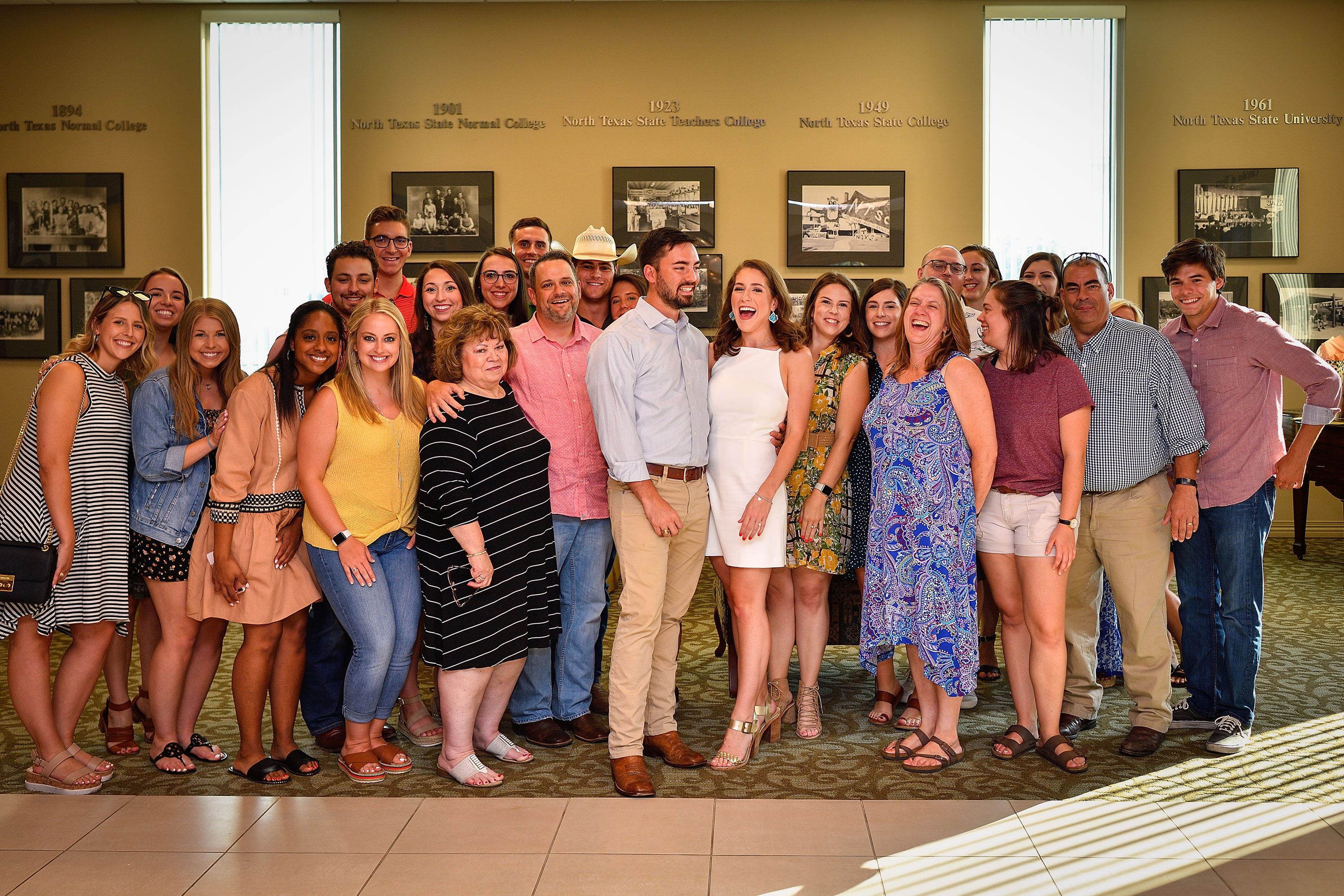 Friends and family gathered at the UNT Alumni Association office to congratulate the newly engaged couple.
