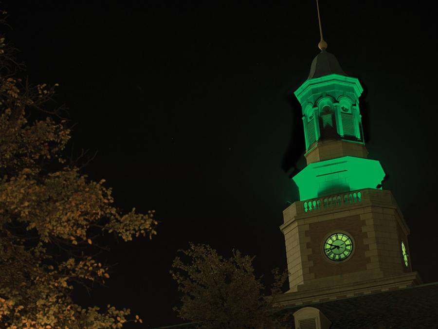 UNT McConnell tower at night light in green
