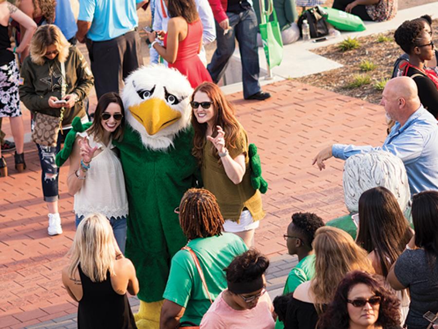 Students at an outdoor UNT Block Party