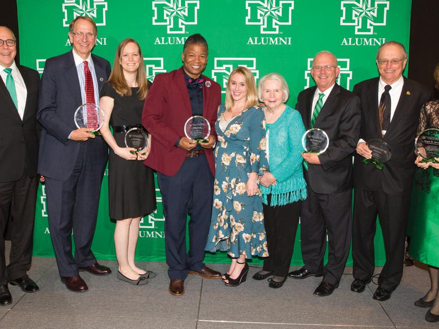 "Pictured at the Distinguished Alumni Achievement Awards Dinner are, from left, President Neal Smatresk, Don Millican ('74), Emily Mauzy ('06, '06 M.S.), Elliotte Dunlap ('97), Sarah Mickelson ('05), Mary Lu Waddell, Stephen 'Steve' F. Waddell ('75, '96 E
