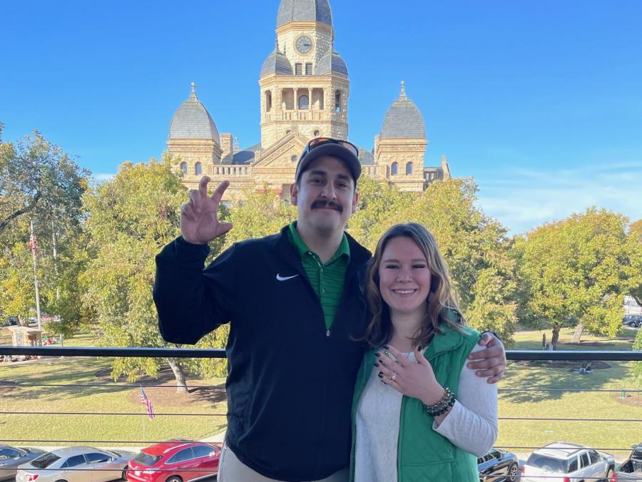 Photo of Jacob Flores and Andrea Plum in front of the Denton County Courthouse