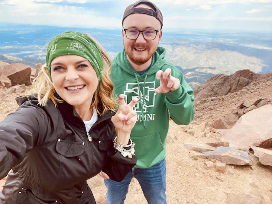 Photo of Corinne French and Zach Yeager doing the Eagle Claw at Pikes Peak