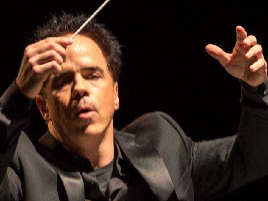Photo of Christopher Renquist North conducting 