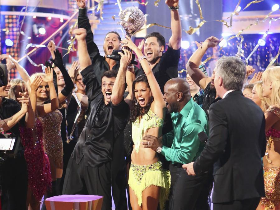 Melissa Rycroft and others holding mirror ball trophy