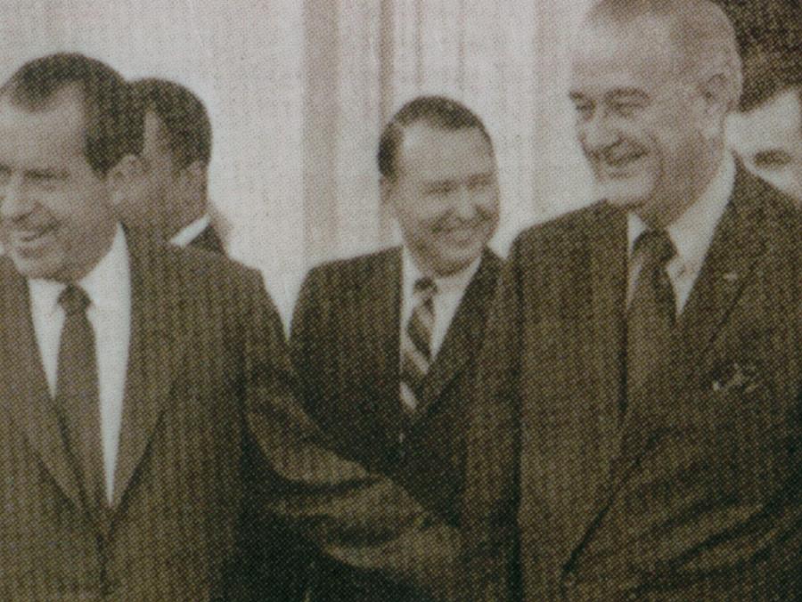 Mike Howard standing with Presidents Nixon and Johnson