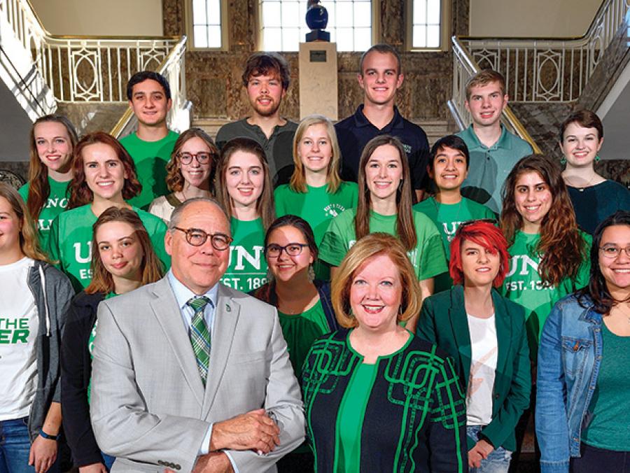 President Neal Smatresk and his wife, Debbie, visit with National Merit Scholars. (Photo by Michael Clements)