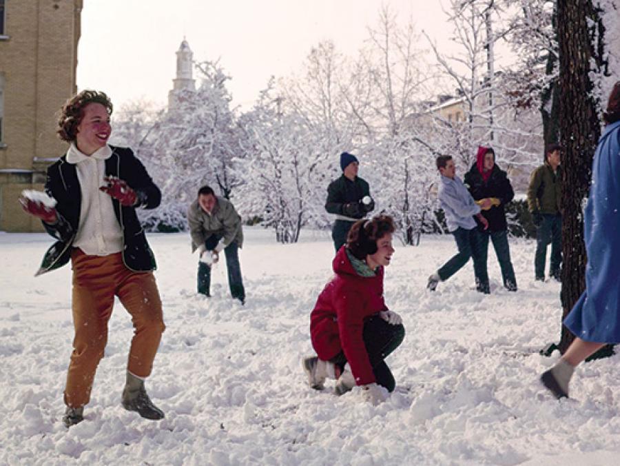 1963 - UNT students having fun at a snowball fight on campus