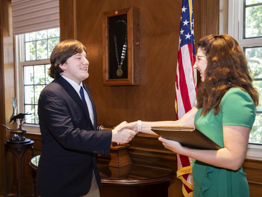 Photo of Andy McDowall sworn in as a non-voting Student Regent