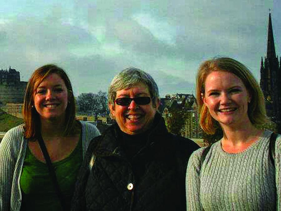 Cynthia Mohr and students standing outside Edinburgh Castle 