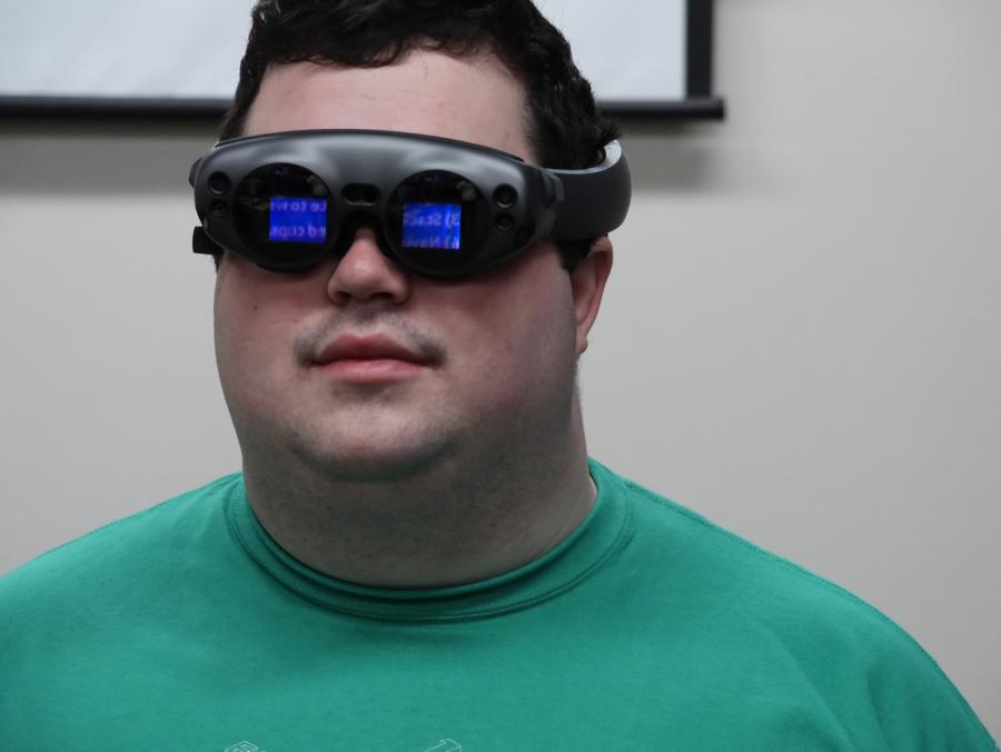 Tim Stern wears augmented reality goggles.