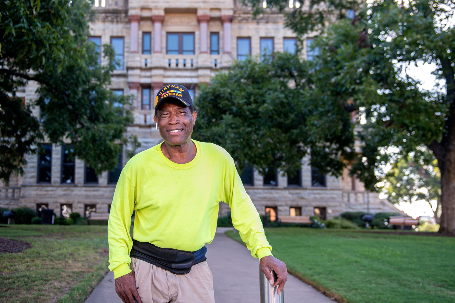 Willie Hudspeth in front of the Denton County Courthouse